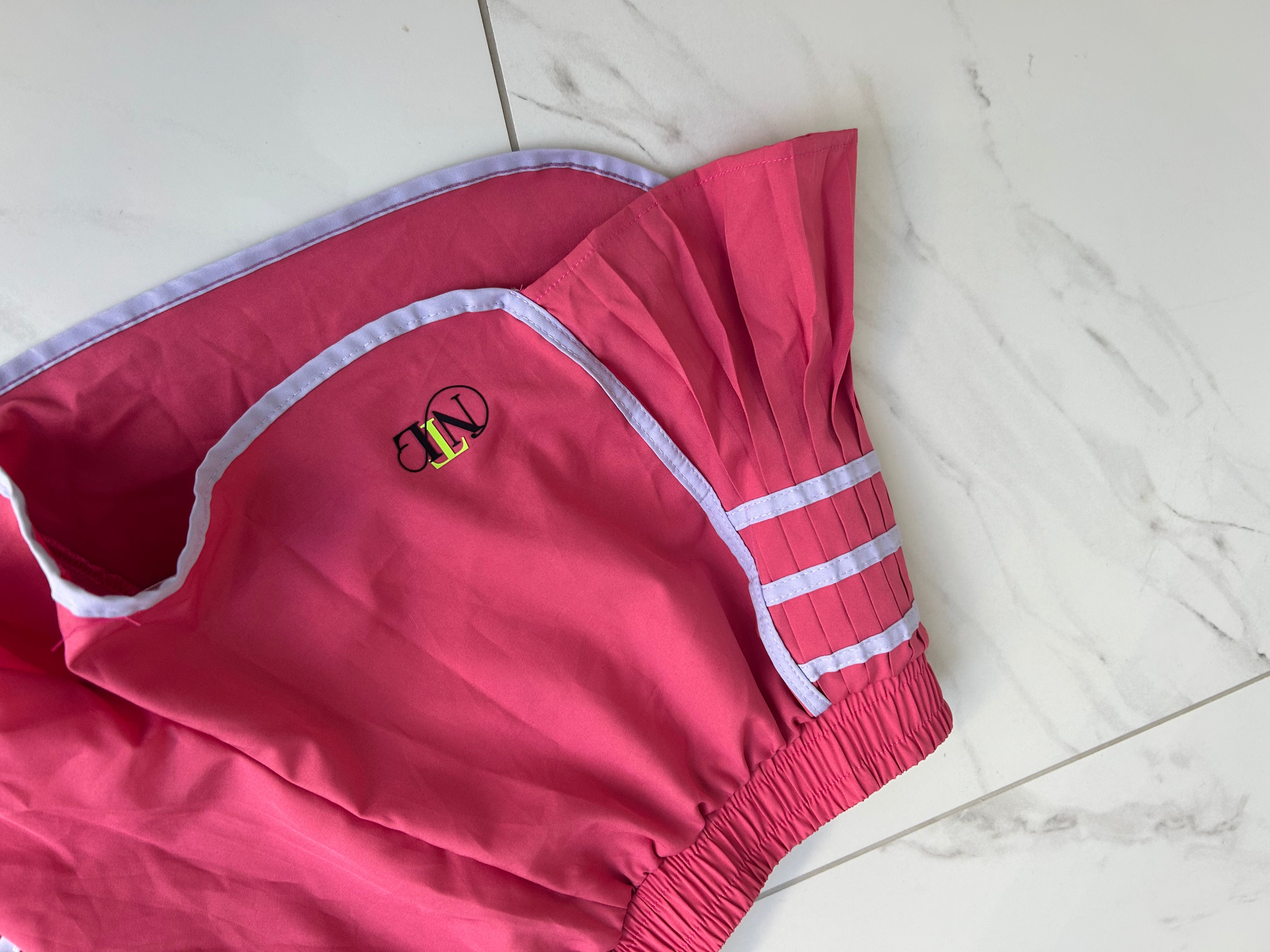 Raspberry tennis shorts