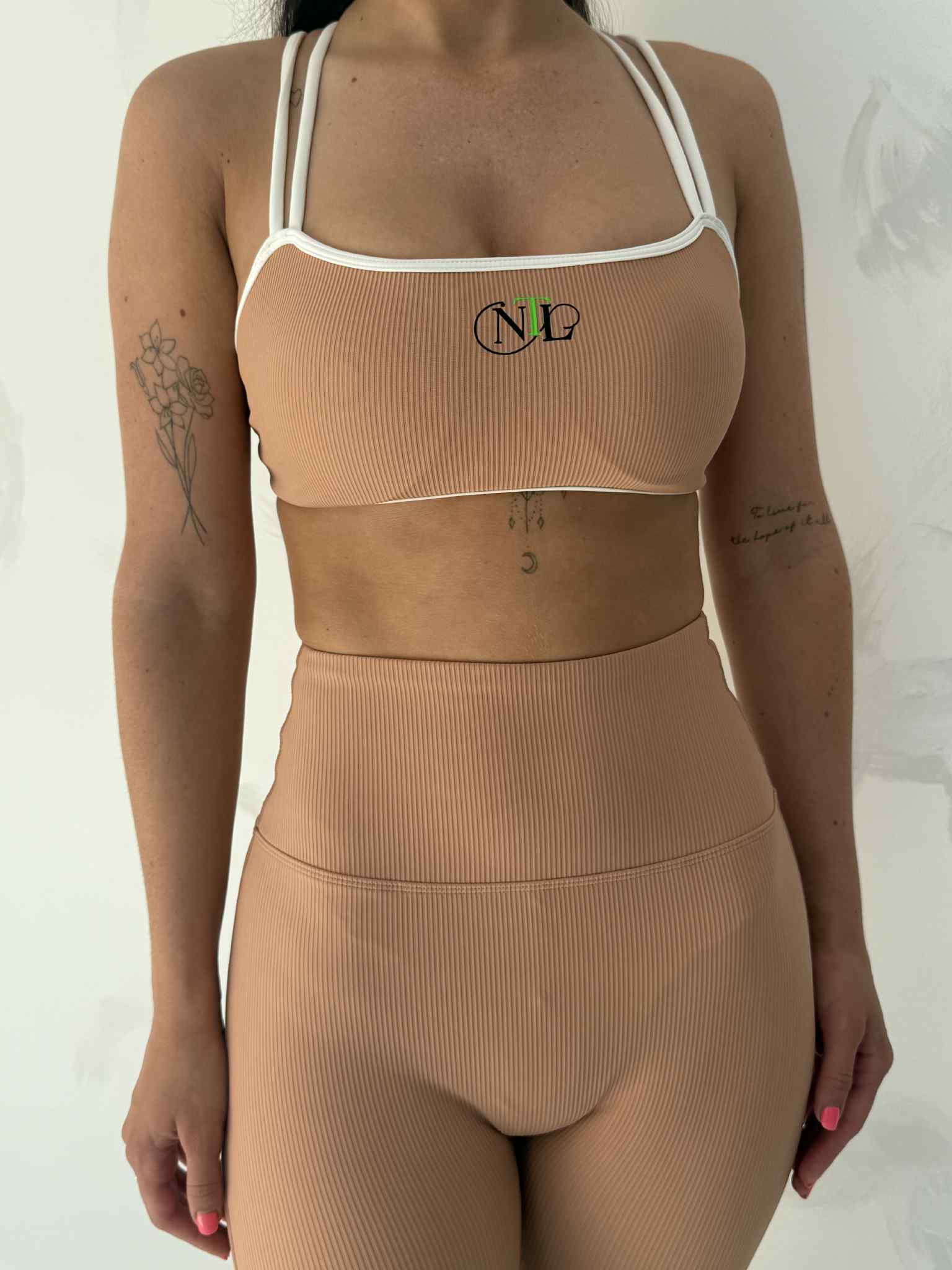High support strapped back sports top