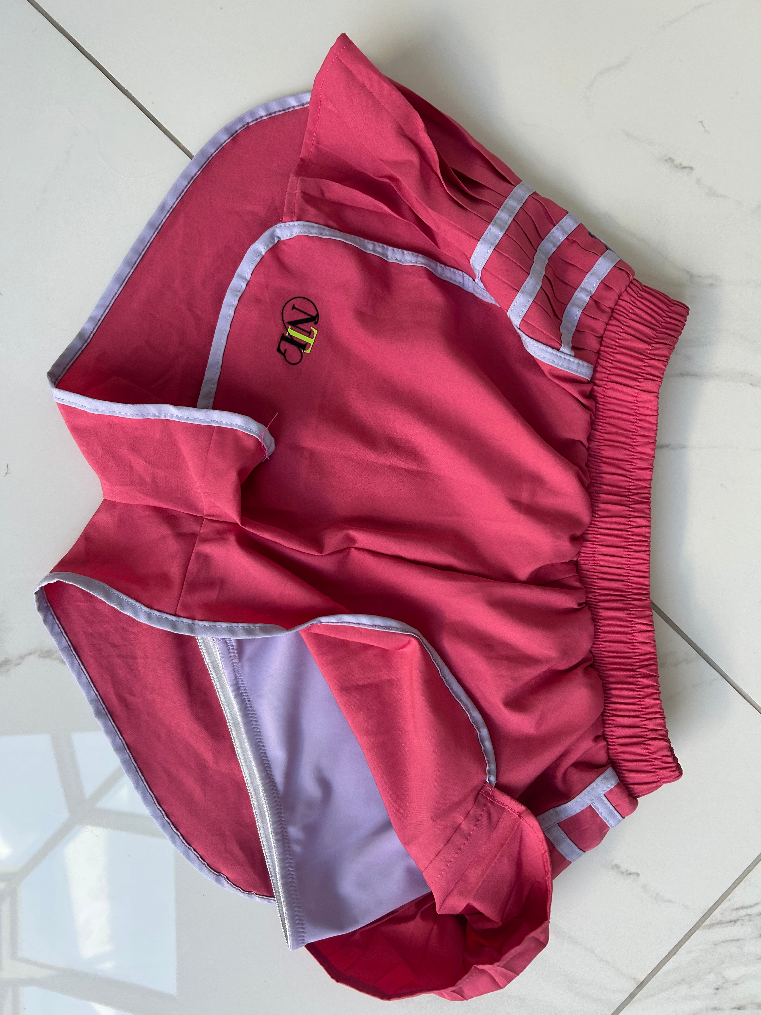 Raspberry tennis shorts