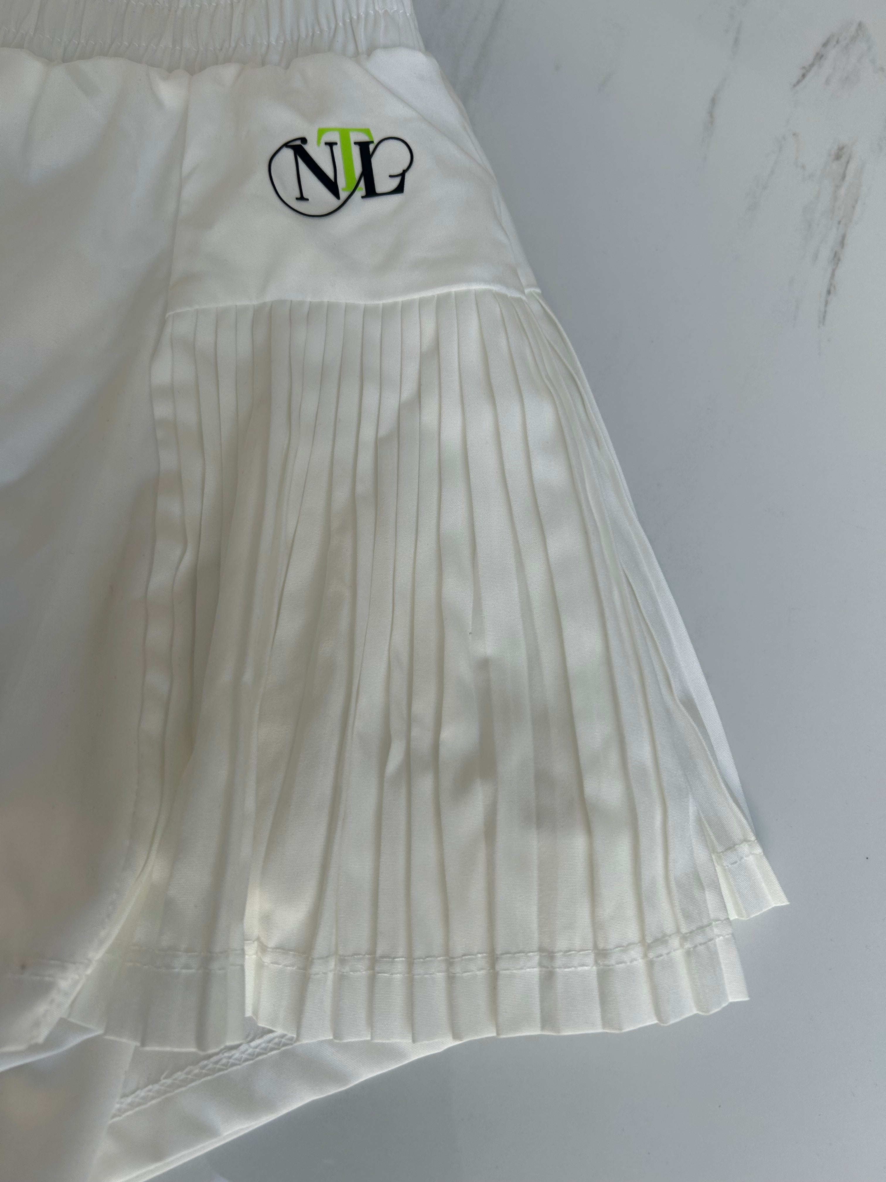 White side pleat tennis shorts