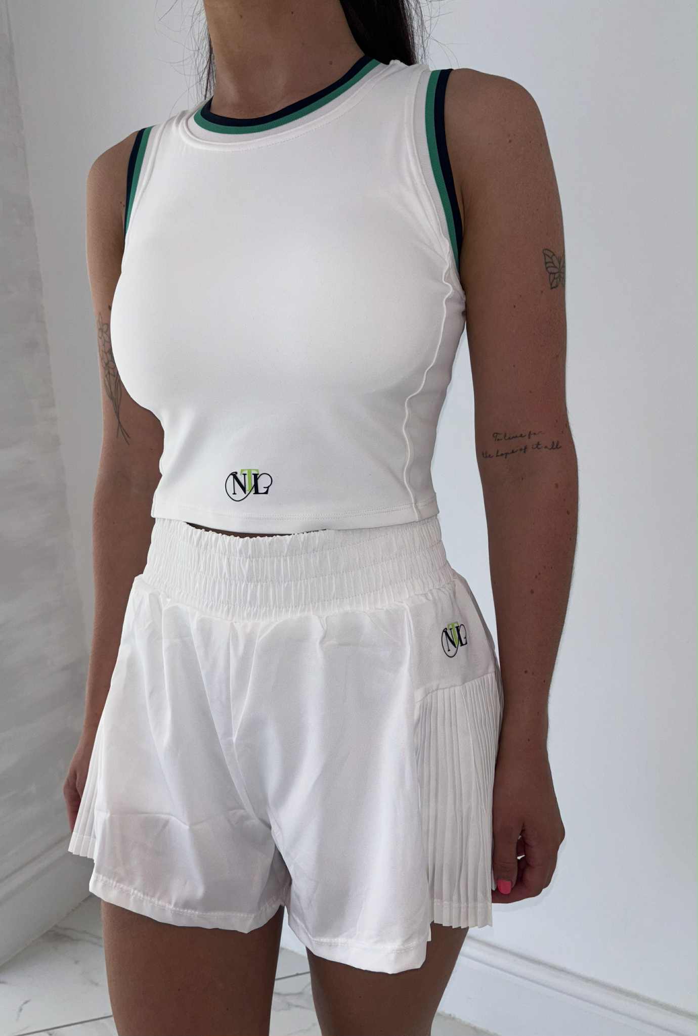 White side pleat tennis shorts